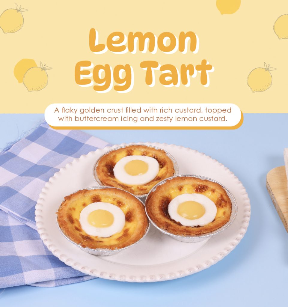 Lemon Egg Tart | A flaky golden crust filled with rich custard, topped with buttercream icing and zesty lemon custard.